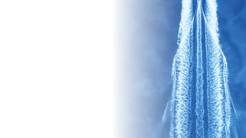 Bright diagonal contrails against a vivid blue sky form parallel lines, fading into blackness on the left, creating a dynamic, soaring feel.